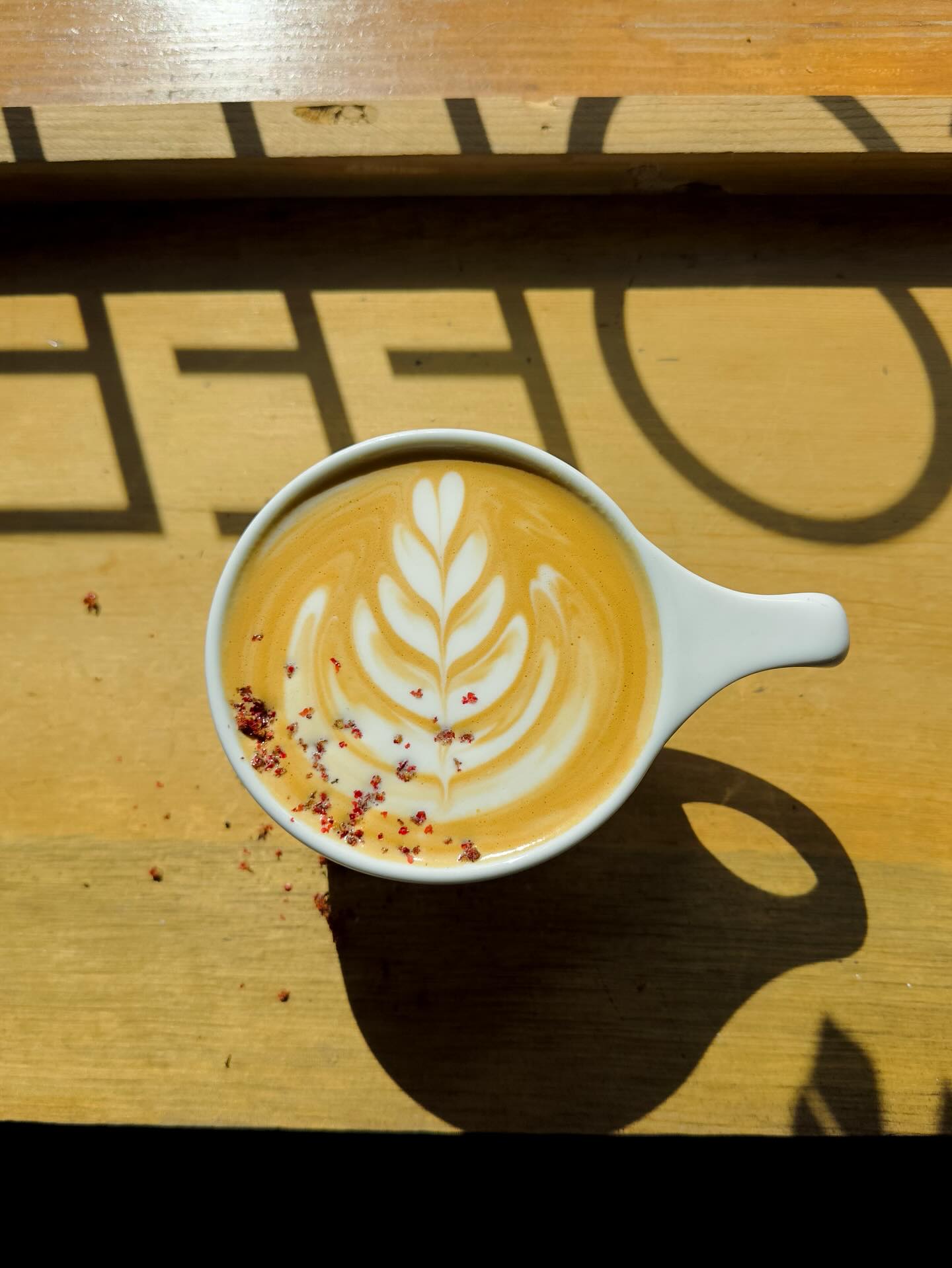 Hot coffee drink with a garnish